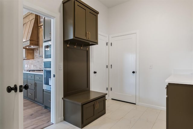 mudroom with light wood-type flooring