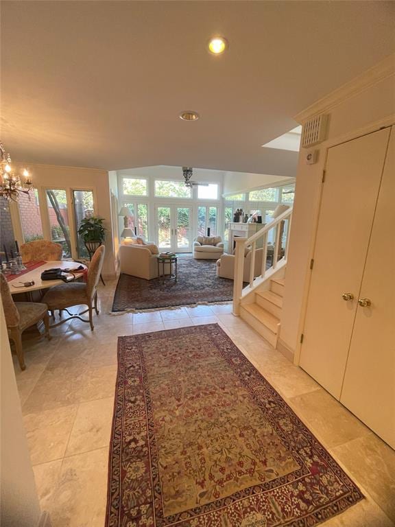 living room with a notable chandelier