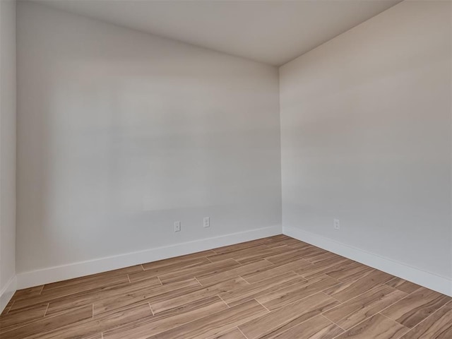 empty room featuring light hardwood / wood-style floors