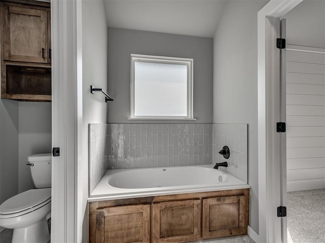 bathroom with a bath and toilet