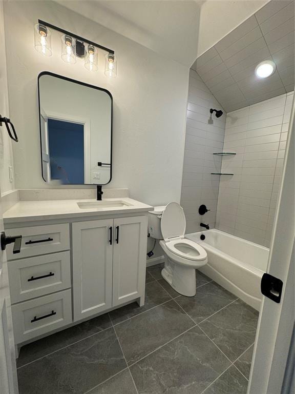 full bathroom with vanity, tiled shower / bath combo, toilet, and vaulted ceiling