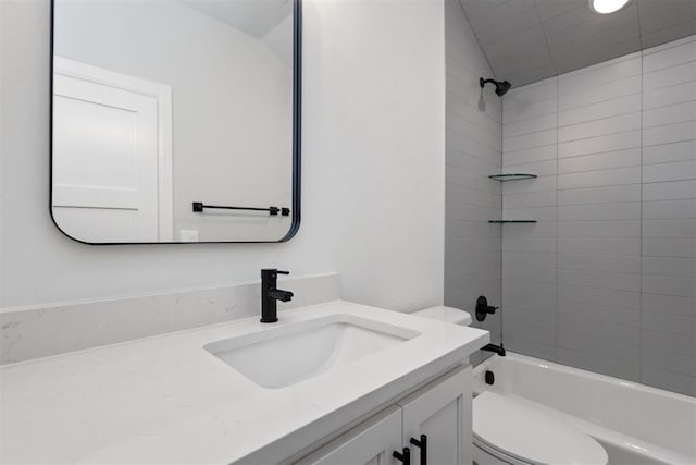 bathroom with toilet, vanity, and shower / bathing tub combination