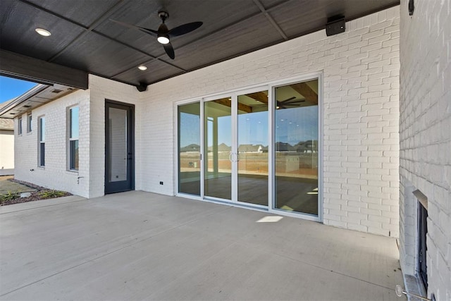 view of patio featuring a ceiling fan