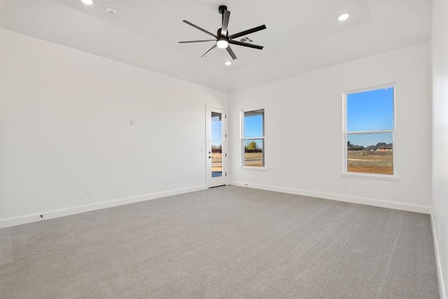 empty room featuring a ceiling fan, recessed lighting, baseboards, and carpet floors