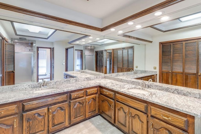 bathroom featuring vanity, tile patterned floors, and an enclosed shower