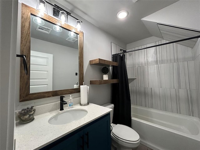 full bathroom with vanity, toilet, and shower / tub combo with curtain