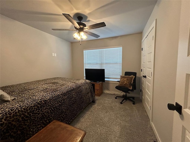 carpeted bedroom with ceiling fan