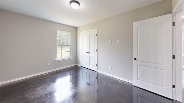 unfurnished bedroom with a closet