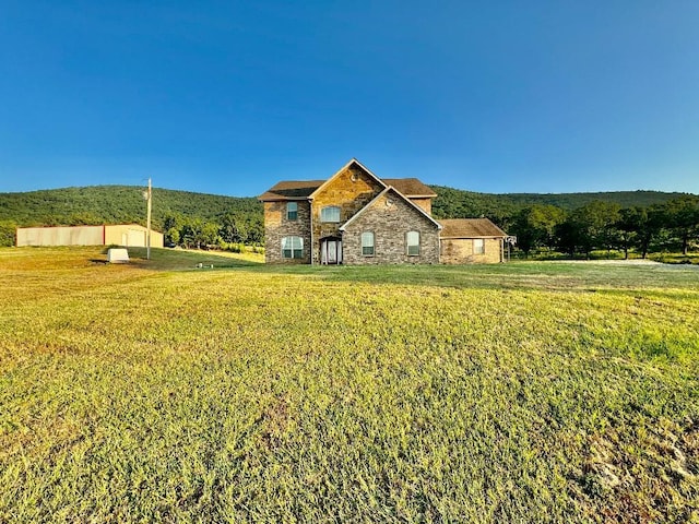 view of front of property with a front yard