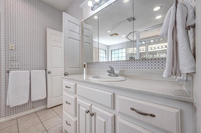 bathroom with vanity and tile patterned floors