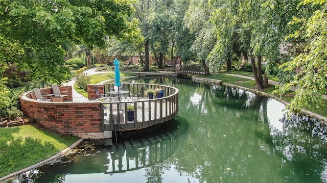 view of property's community featuring a water view