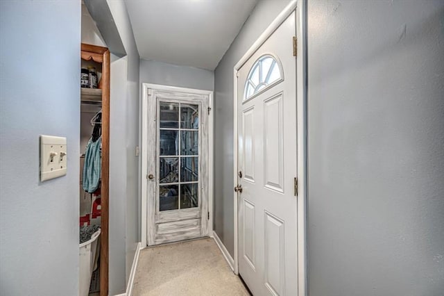 entryway with light carpet