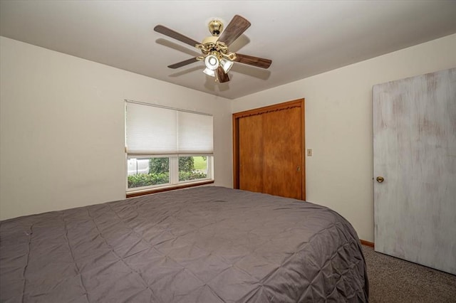 unfurnished bedroom with a closet, light colored carpet, and ceiling fan