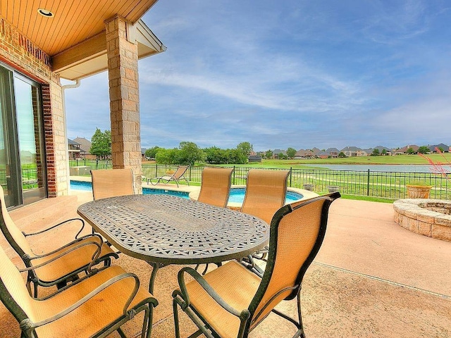 view of patio / terrace featuring a fenced in pool