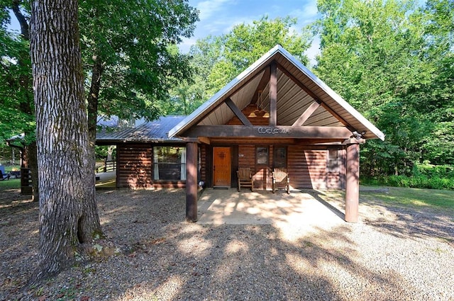 view of log-style house