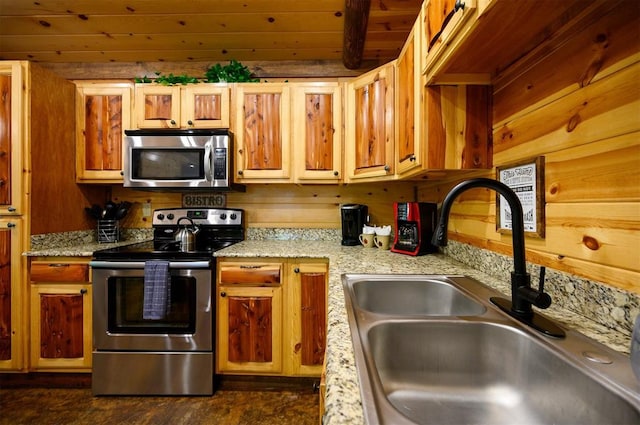 kitchen featuring light stone countertops, sink, wooden ceiling, dark hardwood / wood-style floors, and appliances with stainless steel finishes