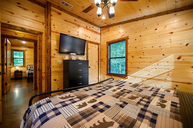 unfurnished bedroom with wood walls, wooden ceiling, and lofted ceiling