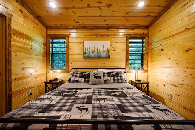 unfurnished bedroom featuring wood walls and wooden ceiling