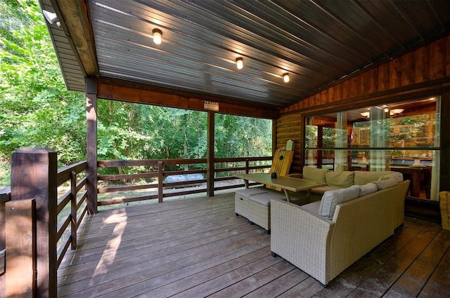 sunroom / solarium with wooden ceiling and lofted ceiling