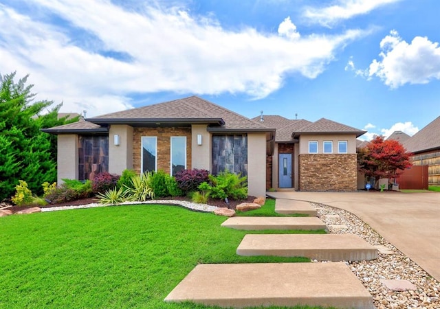 prairie-style home with a front yard