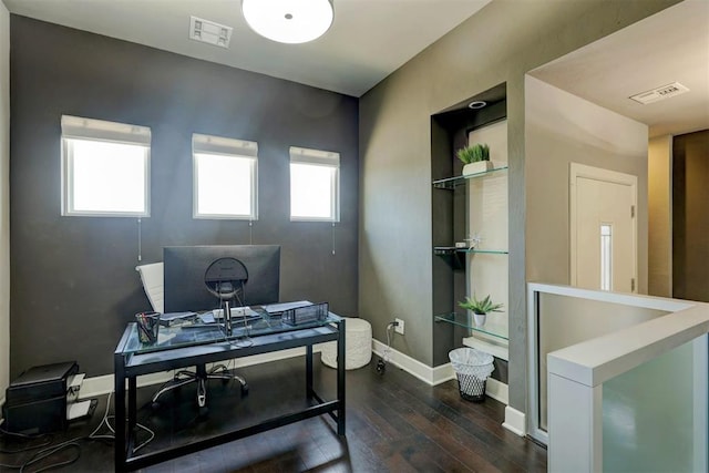 office space with dark hardwood / wood-style flooring