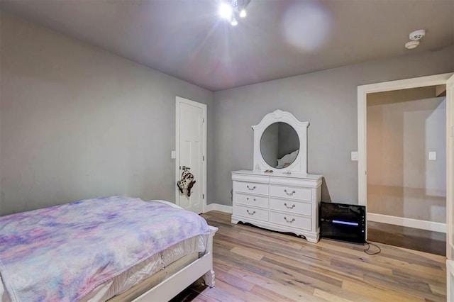 bedroom featuring light hardwood / wood-style floors