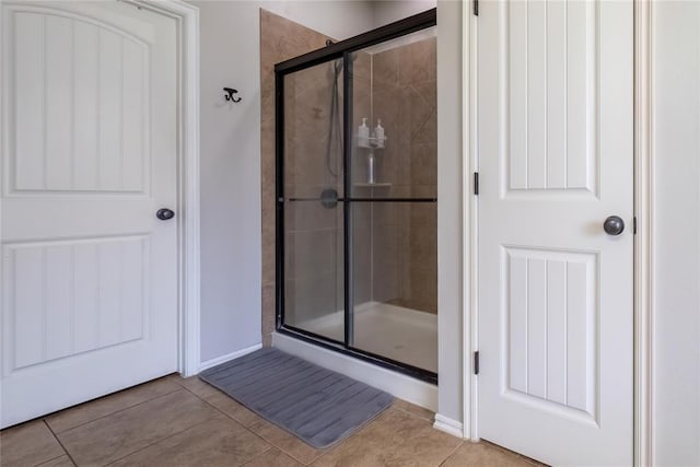 bathroom featuring tile patterned floors and walk in shower