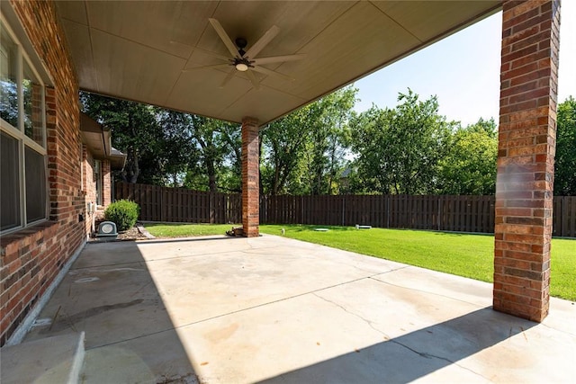 view of patio featuring ceiling fan