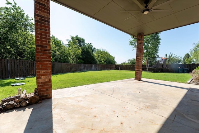 view of patio / terrace with a trampoline and ceiling fan