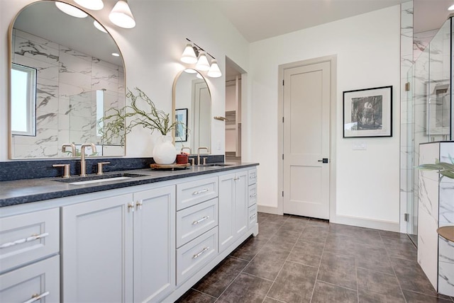 bathroom with vanity and walk in shower