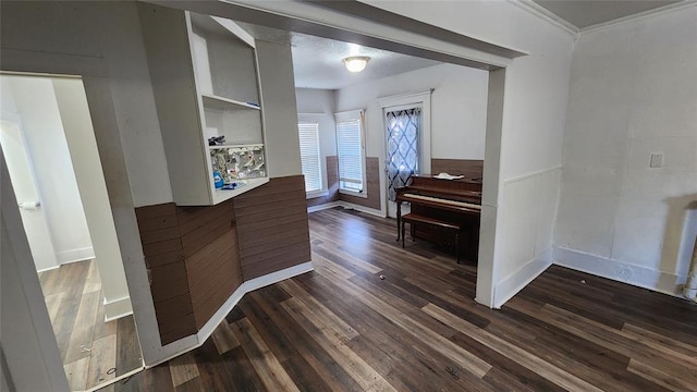 foyer entrance with dark wood-type flooring