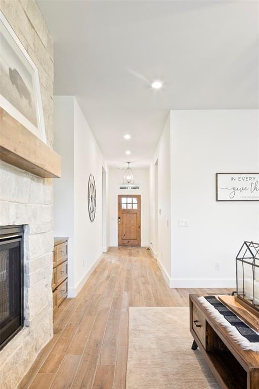 hall with light wood-type flooring