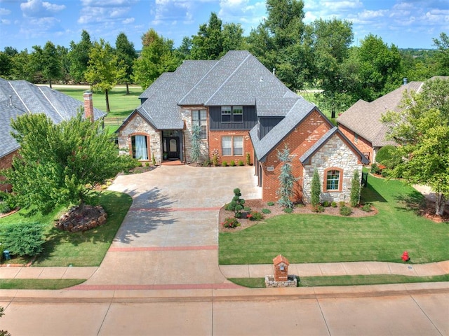 view of front of home with a front lawn