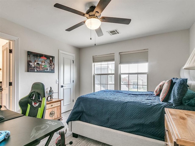 bedroom featuring ceiling fan and carpet floors