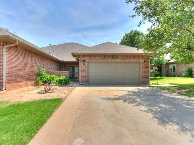 single story home featuring a garage