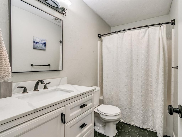 bathroom with walk in shower, tile patterned flooring, vanity, and toilet