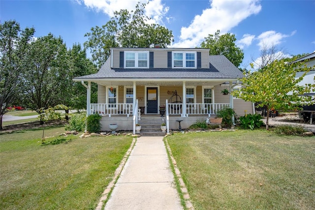 bungalow featuring a porch and a front lawn