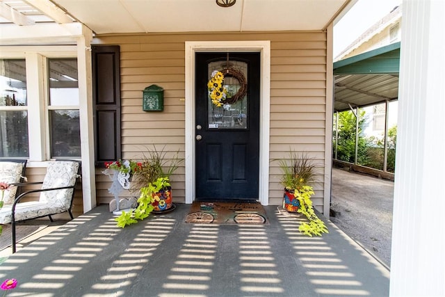 property entrance featuring covered porch