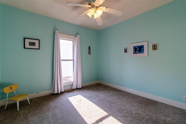 unfurnished room with carpet flooring and ceiling fan