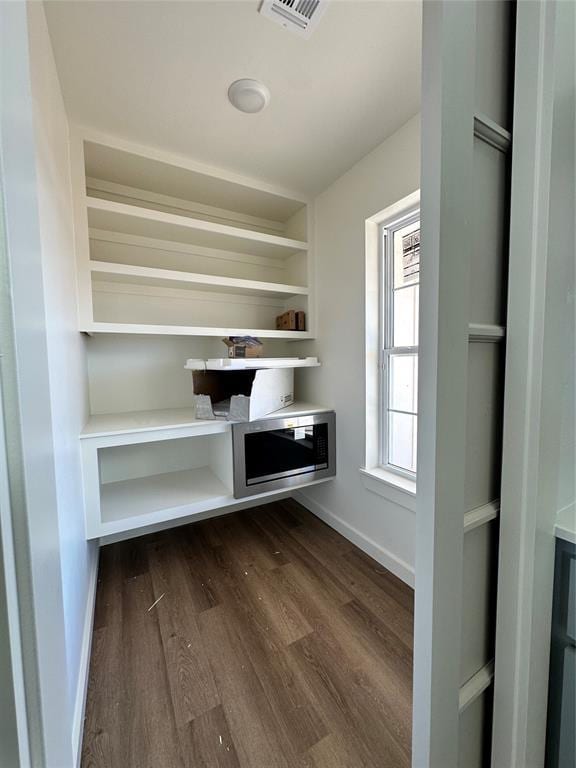 interior space featuring dark wood-type flooring