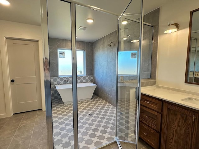 bathroom with vanity and plus walk in shower