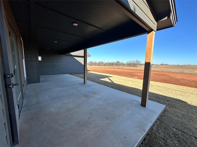 view of patio with a rural view