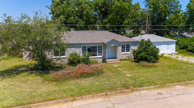 ranch-style house featuring a front lawn