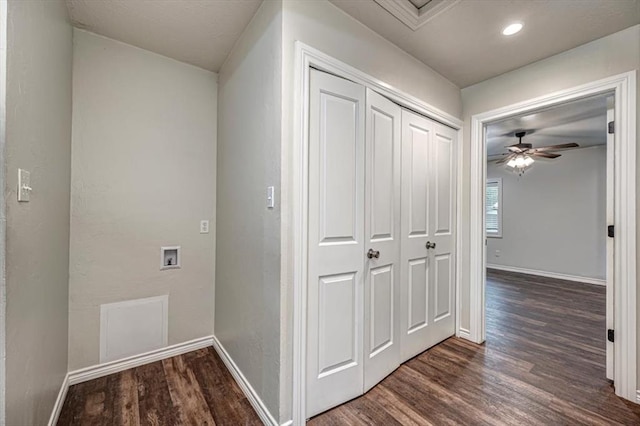 corridor with dark hardwood / wood-style floors