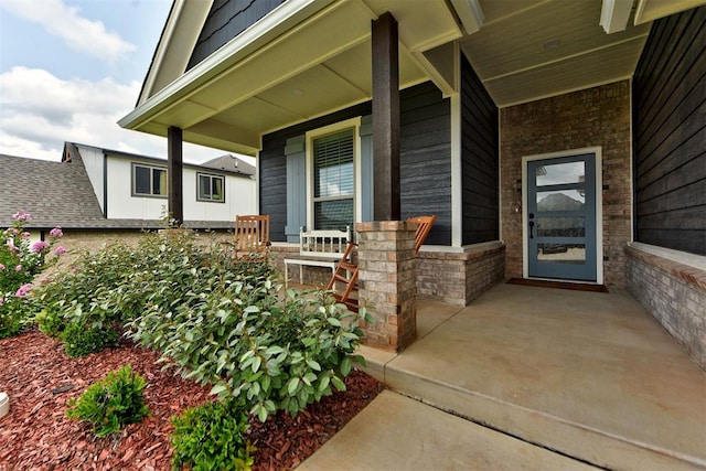 entrance to property with a porch