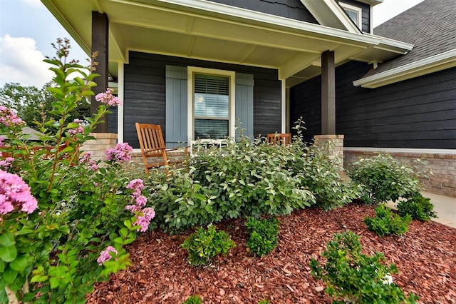 entrance to property with a porch