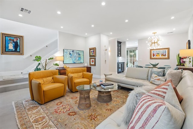 living room with a notable chandelier