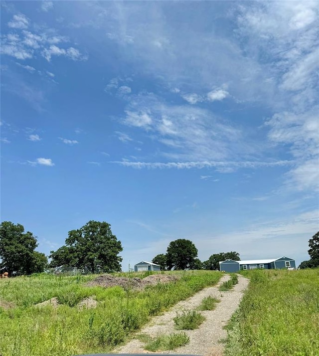 view of road with a rural view