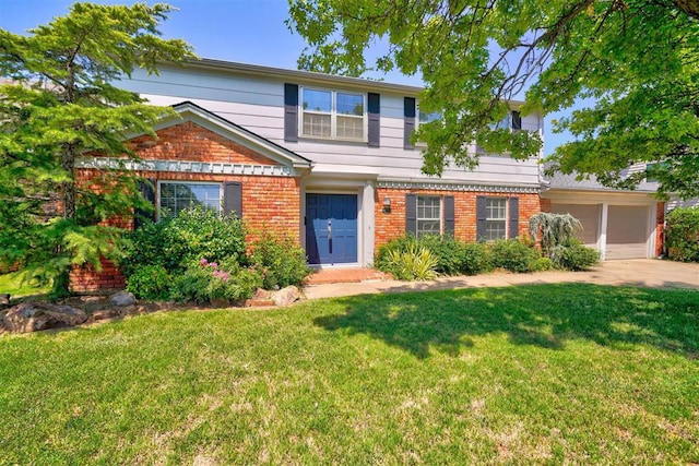 view of front of property with a garage and a front yard