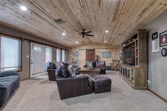 carpeted living room with ceiling fan, lofted ceiling, and wooden ceiling